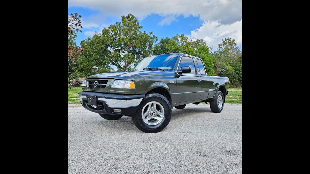 2002 Mazda B3000 4X4 2dr Club Cab Pickup β’ k9motors.com