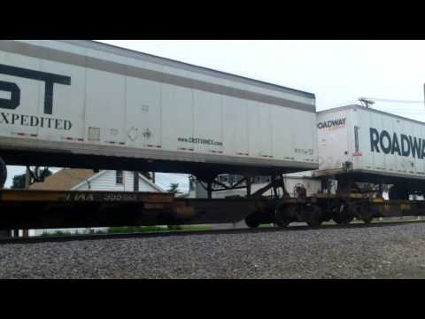 BNSF 7176 sprints with fire burned Dash 9, SD70ACE on westbound stack