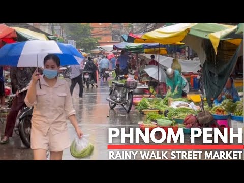 Rainy walking day tour at traditional market Phnom Penh