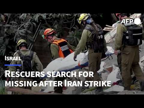 Video Thumbnail: Israeli rescuers search for missing after building hit by Iran missile | AFP