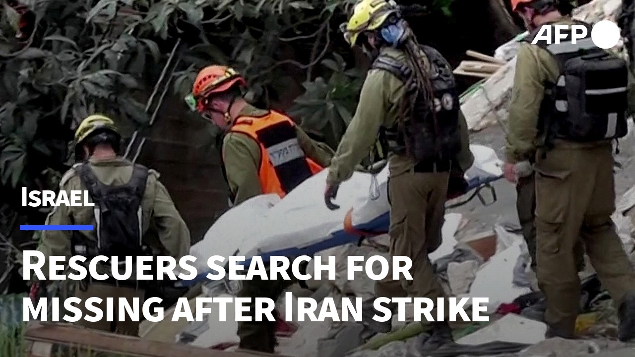Video | Israeli rescuers search for missing after building hit by Iran missile | AFP