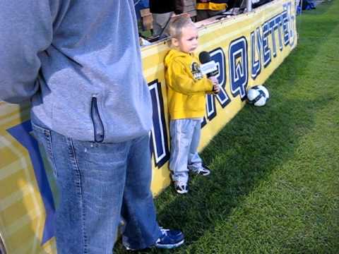 cooper sings national anthem at marquette men's soccer