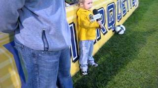 cooper sings national anthem at marquette men's soccer