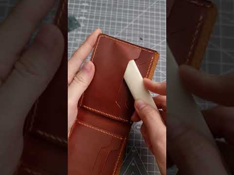 Hand making a leather wallet in 1 minute