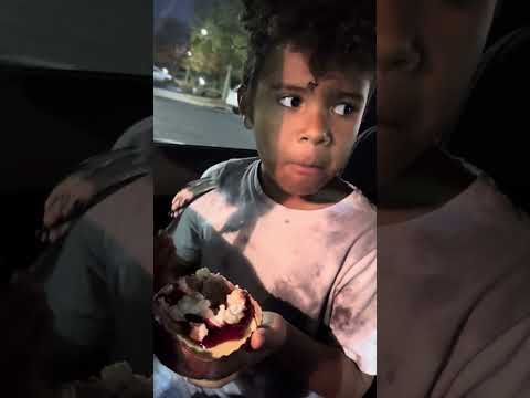 Trying the cherry cheesecake at Crumbl