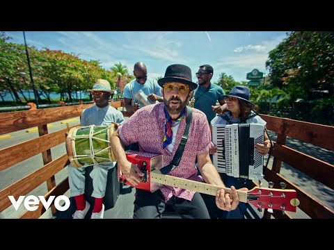 Videoclip de Lámpara Pa' Mis Pies — Juan Luis Guerra