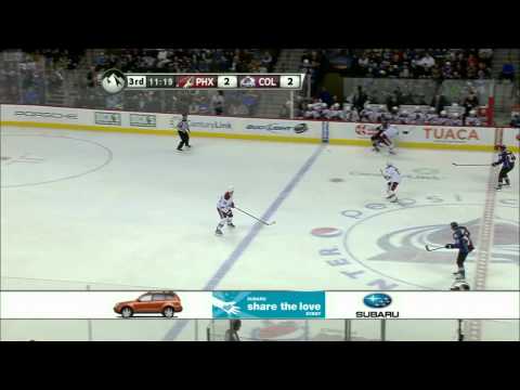 Keith Yandle hipchecks Gabriel Landeskog