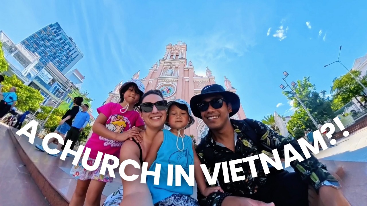 A joyful family explores the historic Da Nang Cathedral together.