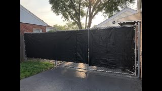 Installing a privacy fence screen mesh on a chain link