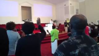 Craig singing at church