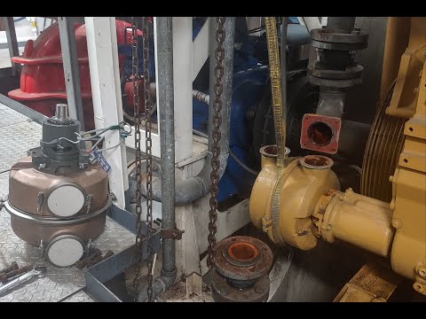 Caterpillar Marine engine. Changing out a raw water pump on a Cat 3516.
