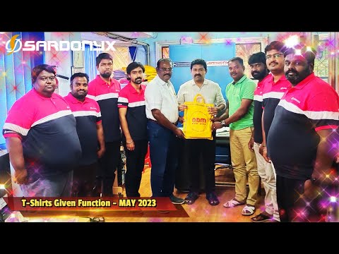 Employees receive new company T-shirts
