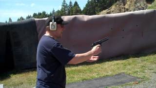 preview picture of video 'Canada Day at the firing range testing a Desert Eagle 44 with one hand - Flip Video'