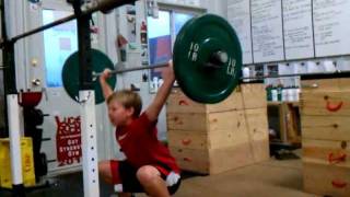 preview picture of video '11 year old athlete performing full snatch from hang position'