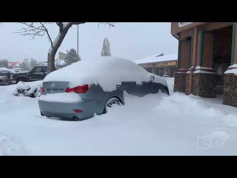 01-25-2021 Flagstaff, AZ - Snow Covered Roadways and Businesses Shoveling Snow