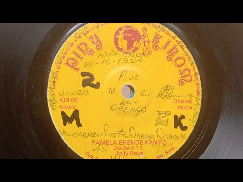JOLLY BOYS BAND. PAMELA EKENDE KANYO.BY OGUDA OTC.PINY KIROM 06 SIDE B(FAIR QUALITY)