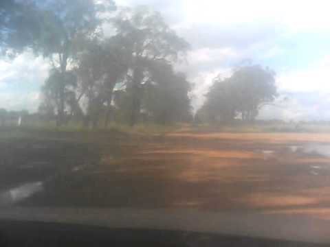 race cam in bitza x race car on muddy road