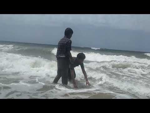 Afeef and Areeb playing with the waves of ocean 🌊