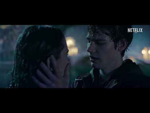Trailer montage: Nica and Rigel across a crowded party, neon lights and slow-motion glances