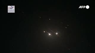 Israeli army interceptions light up the sky seen from the outskirts of Jerusalem
