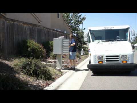 Mailman Delivering Mail