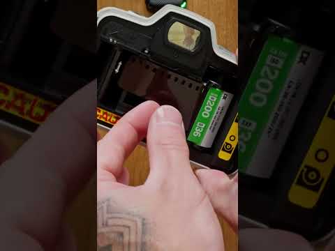 How load 35mm film camera with film  #photography #filmphotographer #filmphotography #film #fujifilm