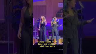 Kelly taking shots with fans and riffing with her amazing BGVs is fire!