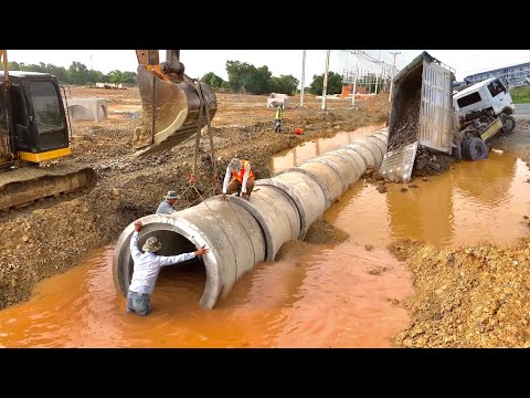 Epic Skilled Operators Process Huge Concrete Drainage Pipes installation, Restoring & Filling Rock!