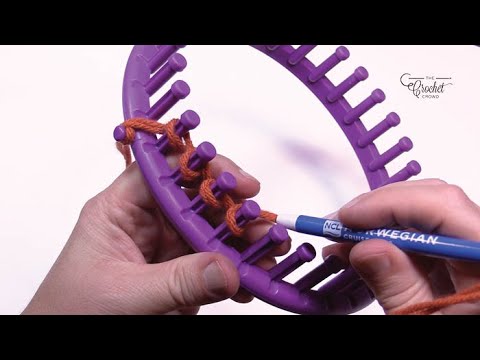 Part of a video titled Loom Knit: Make Your Own Yarn Feeder | The Crochet Crowd