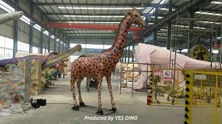 Animatronic giraffe with moving neck and head