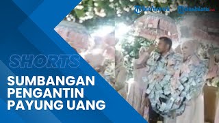 Viral Video Pasangan Pengantin Berkalung Uang Kertas, Diberi Sumbangan yang Tak Dimasukkan Amplop