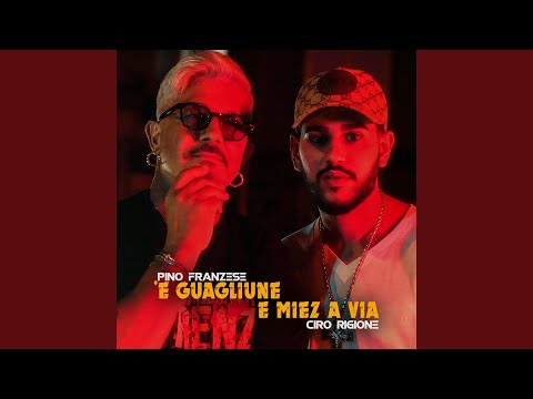 E Guagliune E Miez A Via