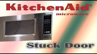 Microwave stuck door does not open