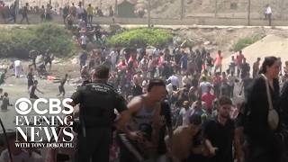Thousands of migrants stream into Spain from Morocco, authorities report 9 dead