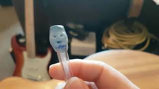 3 Steps to Retrieving Your Guitar Pick From Your Guitar