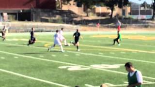 Los Alamos' Eric Burnside slips ball past Roswell Goddard's keeper for 1-0 win