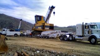 Process of moving a CAT 5130B excavator