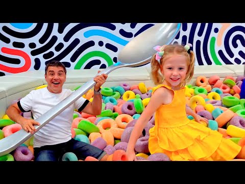 Nastya and dad have fun in the playgrounds and the amusement park for kids