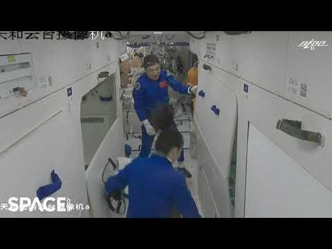 China's Shenzhou 13 crew docks and enters space station