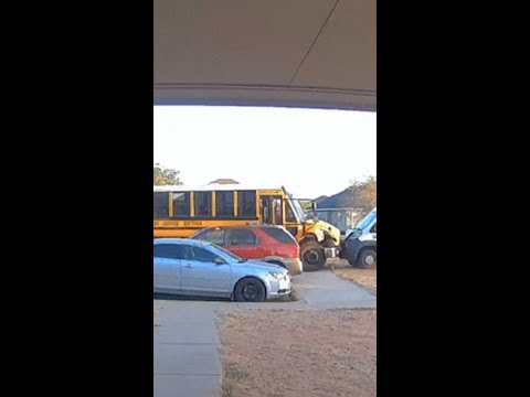 Doorbell camera captures the moment a school bus crashes