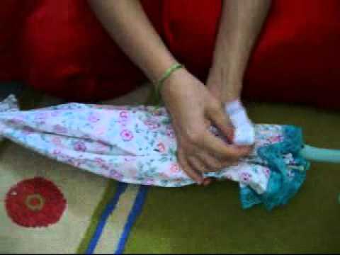 Sombrinha de tecido.