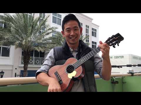 Jake Shimabukuro Demonstrates Putting On A Ukulele Strap