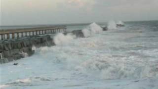 Super Long Wave Crashes Over Breakwater Like New Orleans