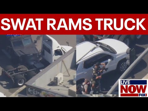 WATCH: SWAT Bearcat slams into semi-truck
