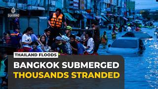 Thai capital flooding: Police help evacuate thousands of people from homes