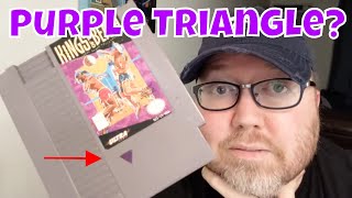 Why Do Some NES Games have a Purple Triangle?
