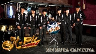 En Esta Cantina Lyrics English Translation