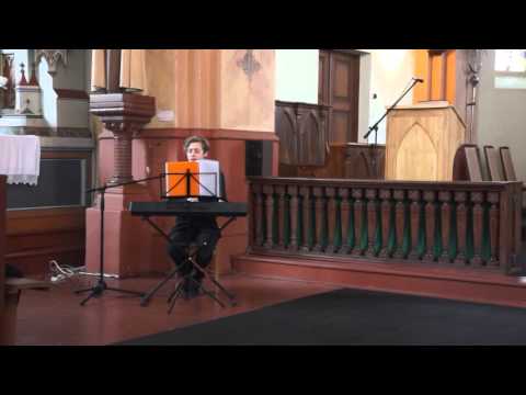 Eligijus Jukna dainuoja Skirsnemunės Šv. Jurgio bažnyčioje