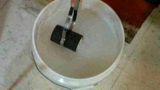 Lost Wax Casting Step 6 of 9 Quenching the hot flasks