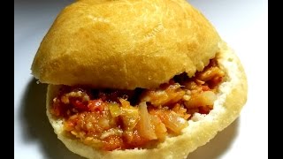 Fried Bake (Floats) with Tomatoes and Saltfish | Taste of Trini